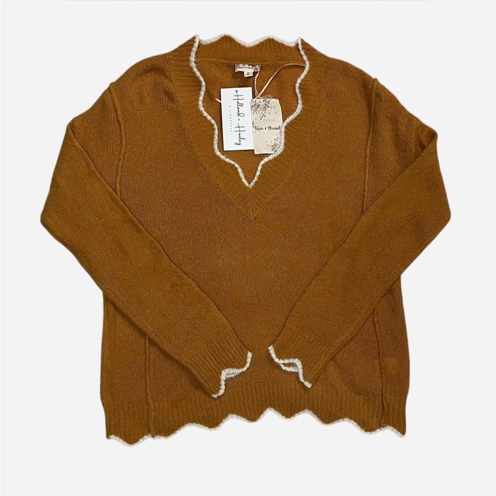 Brownish orange scalloped edge sweater